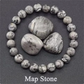 Detail of natural Map Stone beaded bracelet with matching polished gray marble stones - Map Stone