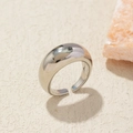 Macro detail of polished silver irregular dome ring on natural textured stone background - Adjustable Open / Silver Dome Bombe