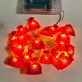 Christmas LED string lights with red snowflake gift bag pendants and battery box - 1m 10-LED (2AA Battery Model) / Snowflake Lucky Bag