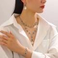 Silver layered necklace set with grey gemstones and hammer-textured metal pendants - 2 Necklaces + Bracelet + Earrings Set (21)
