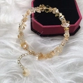 Irregular natural citrine stone bracelet for women on a plush white surface with box - Citrine