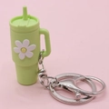 Light green mini cup keychain with daisy flower pattern and silver metal clasp - Green Flower Cup Keychain