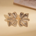 Detail of 18K gold plated flower earrings with etched petals and vintage metal texture - Silver Needle Gold Flower