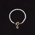 Pearl bracelet featuring a gold OT buckle and sparkling diamond-set letter Q pendant - Gold Letter Q (SL2013)