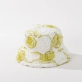 Close-up of white plush bucket hat featuring delicate yellow floral mesh appliques - M (56-58cm) / Green