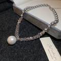 Macro detail of zircon pearl necklace with crystal beads on gray velvet jewelry box - Gray Pearl Crystal Splicing Style / Silver Grey