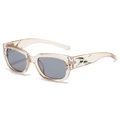 Trendy square sunglasses with champagne frames and grey lenses at 45-degree angle - Tea Frame Grey Lens