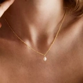 18k gold plated stainless steel chain necklace with natural white pearl pendant on model - Single Gold Style 2