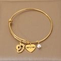 Gold-plated MOM bracelet with baby footprint heart charms and a white pearl - Baby Footprint Style (KB203623-Z)