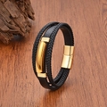 Men's multilayer black braided leather bracelet with golden magnetic buckle on wood - Gold Metal Plate Decor