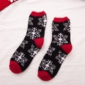 Thick coral fleece socks in black and red with festive white snowflake patterns - One Size / Black Snowflake