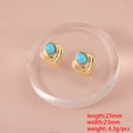 Macro view of gold heart earrings with turquoise inlay and size dimensions 23mm x 23mm - Heart Stud Earrings With Turquoise Stone