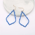Macro detail of irregular hollow teardrop earrings with bright blue lacquer finish - Royal Blue