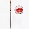 Detail of rose gold lip brush with dual-tone synthetic bristles and close-up application - Concealer Brush Gold