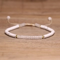 Adjustable hand-woven bracelet featuring white marble beads and pink translucent stones - No.88 White Turquoise & Quartz