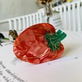 Detail of creative red bell pepper hair claw clip made of glossy cellulose acetate - Red Bell Pepper