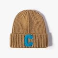 Brown ribbed knit beanie featuring a blue fuzzy letter C patch and thick texture - One Size / Khaki