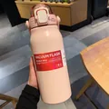 Detailed close-up of pink matte 304 stainless steel vacuum flask with a wide mouth lid - 1700ML / Pink
