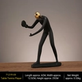 Deko-Figur aus mattem schwarzem Harz eines Tischtennisspielers mit goldenem Kopfdetail - Tischtennisspieler - Goldener Kopf
