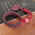 Adjustable hand-woven phone wrist lanyard in red and green paracord with a secure metal ring - Short [Red & Dark Green] Adjustable Braided Lanyard + Wine Red Patch