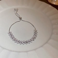 Close-up of a silver-toned slider bracelet with double-row sparkling cubic zirconia - 20# Bracelet - Silver (Double Row Wave Zircon Style)