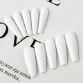 Close-up of matte white coffin press-on nails showing smooth frosted texture and finish - Porcelain White