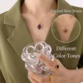 Titanium steel square pendant necklace with amethyst and gold rings on model - Gold Natural Purple Stone