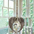 Detail of faceted crystal ball with silver angel wings hanger and purple beads decoration - Purple