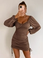 Detail view of a brown long sleeve mini dress featuring ruched design and a sweetheart neckline - XS / Dark Brown