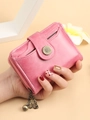 Pink short wallet with daisy clasp and tassel zipper, featuring a stylish card holder design - Pink