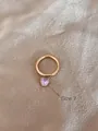 Anello in acciaio dorato misura 7 con ciondolo in zircone viola a forma di cuore - US 7 / Rosa
