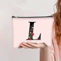 Detail of pink canvas makeup bag featuring a large letter L with red floral print - Light Pink Rose Letter L (jiayingpbb084)