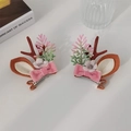 A pair of Christmas reindeer antler hair clips with pink bows and flocked brown texture - Pink Pair