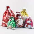 Assorted colorful Christmas gift bags featuring festive patterns and ribbon drawstrings - Set 3 (25-Piece)