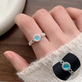 Vintage silver open ring featuring a round blue gemstone with detailed woven texture band - JZ5195 Silver Vintage Blue Gemstone Woven Pattern Ring