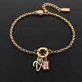 14K gold plated stainless steel bracelet with letter pendant and pink crystal charm - Letter V