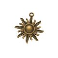 Macro detail of a vintage sun-shaped bronze alloy pendant with textured rays and loop - Antique Bronze