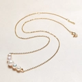 Elegant minimalist necklace with five white gradient pearls on a fine gold chain - Freshwater Pearl (White)