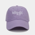 Detailed view of white gothic Babygirl embroidery on a purple cotton baseball cap - Light Purple