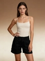 Detail of beige ribbed camisole and black cotton twill shorts on a model - S / Black