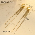 Detail view of gold geometric tassel earrings with 10cm length and 1.17cm ball diameter - Gold Ball Tassel