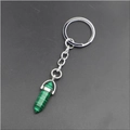 Macro detail of a hexagonal green malachite stone pendant on a silver metal keychain - Malachite