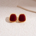 Close-up of vintage geometric stud earrings with dark red velvet inlay and gold frames - Silver Earring Post - Red - Square