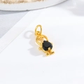 Detail shot of a gold girl figurine pendant with a heart black gemstone inlay for DIY - Little Boy - Black Heart
