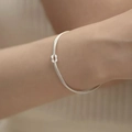 Minimalist silver knot bracelet for women featuring double strands and elegant woven detail - Silver Minimalist Fine Line Knot (MY35727)