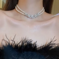 Double-layered pearl necklace featuring sparkling rhinestone flower accents for women - Double Layer Zirconia Pearl Necklace (X3831) / Cream