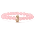 Pink crystal elastic bracelet with a bird pendant charm against a white background - Rose Quartz