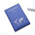 Macro detail of dark blue PU leather passport cover with silver map and airplane engraving - Dark Blue