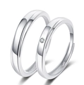 Minimalist silver-plated couple rings set featuring one solitaire stone and a sleek band - Ql025 / Male Style