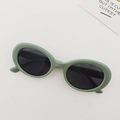 Retro oval sunglasses for children featuring a light green frame and dark tinted lenses - Blue